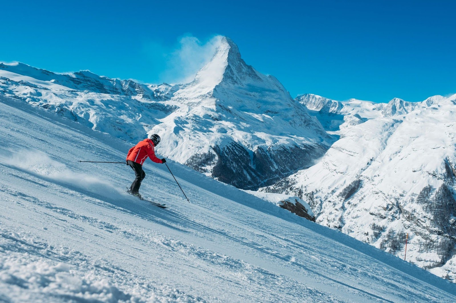 Person skiing down the slopes